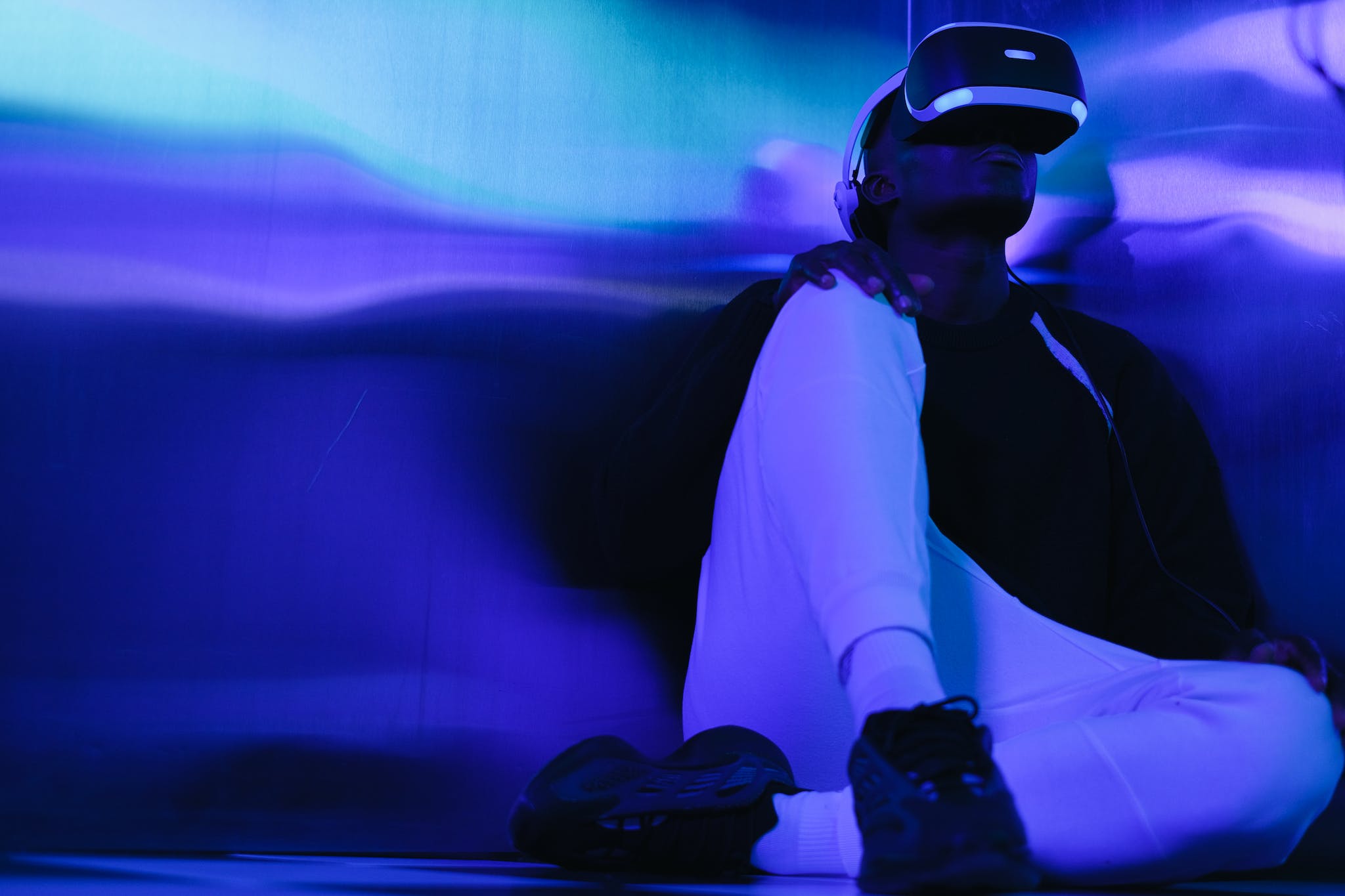 Man Playing a Virtual Reality Game with a VR Headset